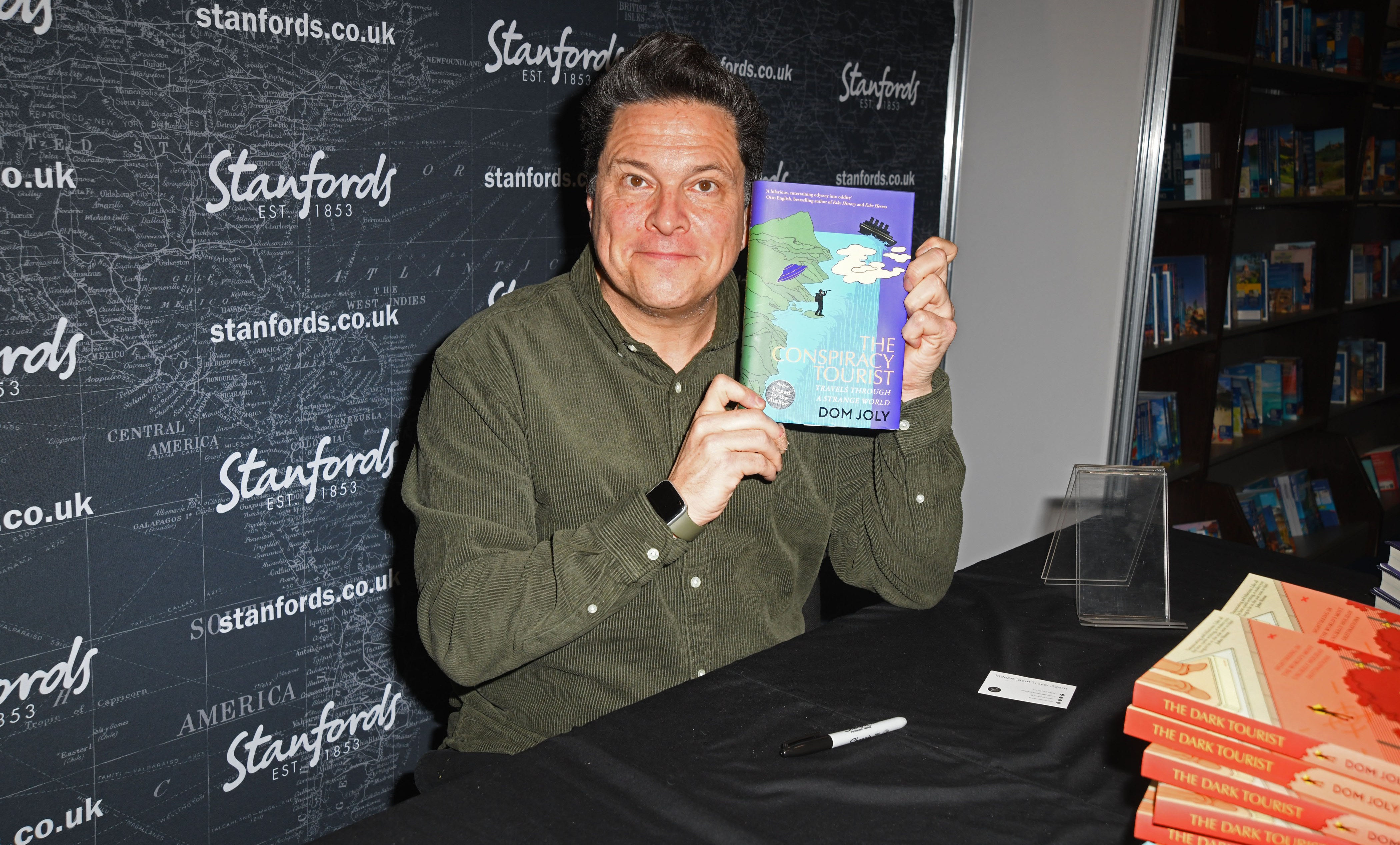 Joly with his book The Conspiracy Tourist in February